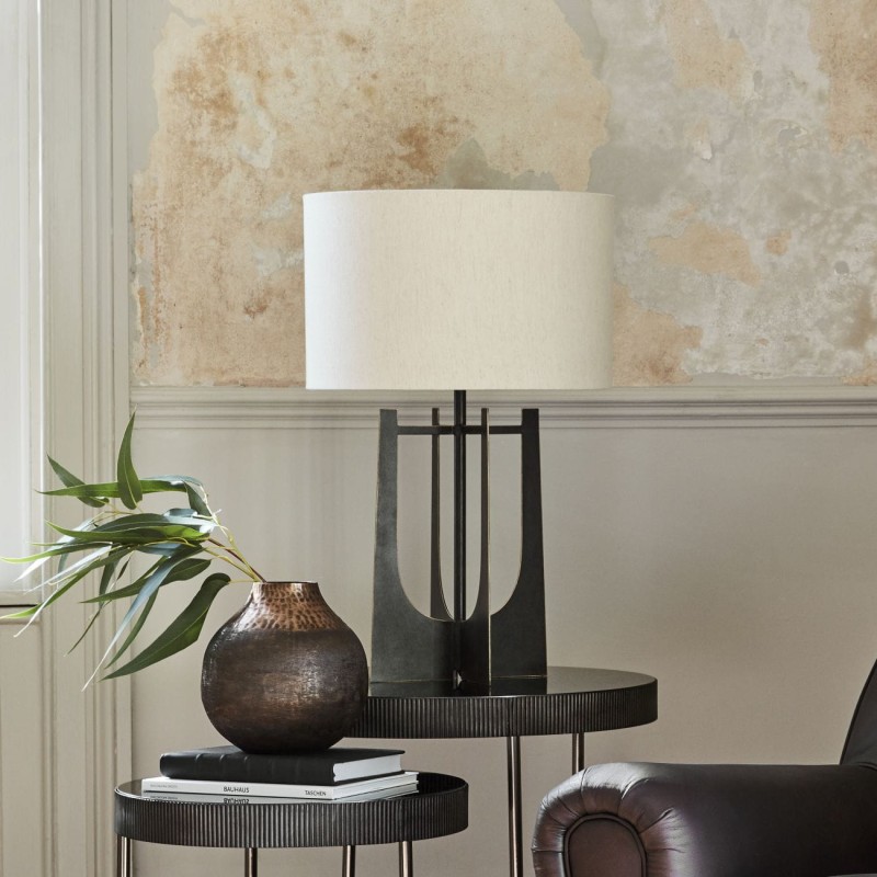 Sculptural black table lamp for a console table