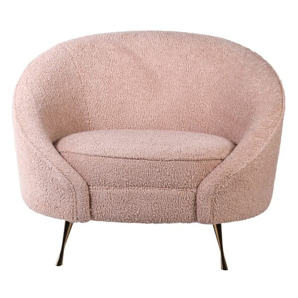 Pink bouclé armchair with a wide curved seat