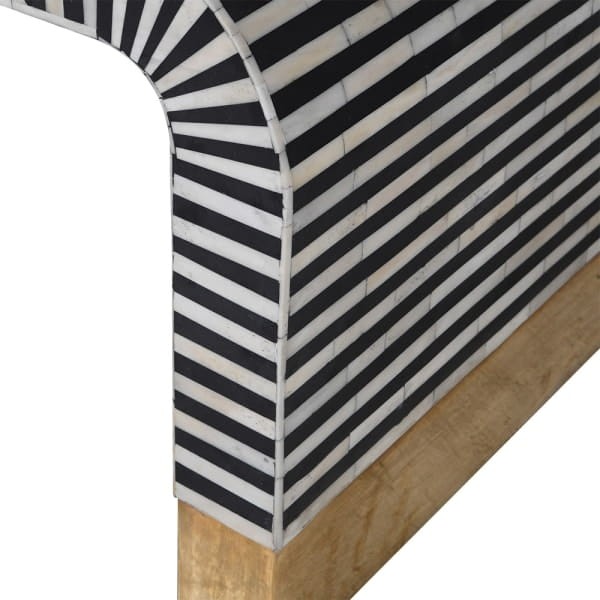 Close-up of Muswell coffee table showing striped bone inlay and brass detailing