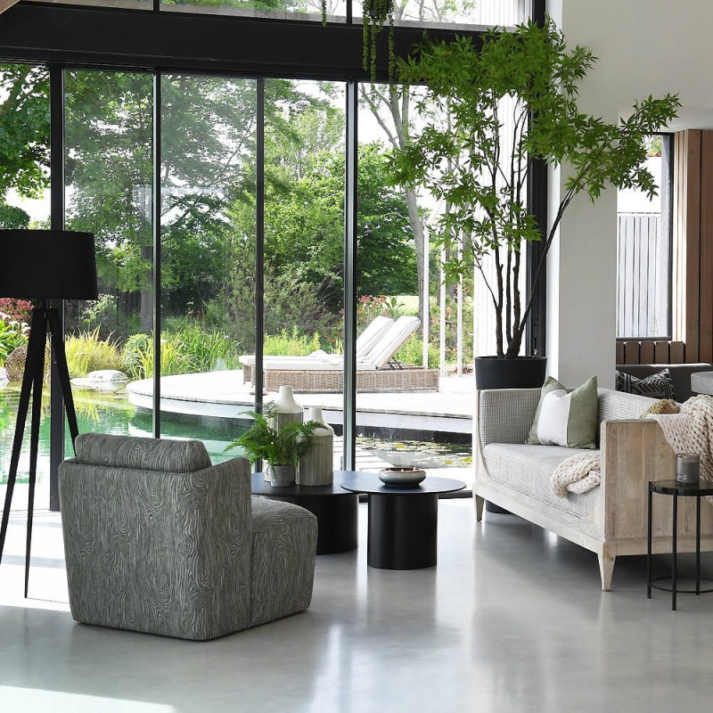 Black metal tripod floor lamp