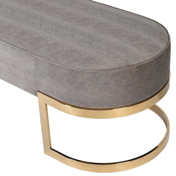 Grey upholstered bench with polished gold stainless steel frame