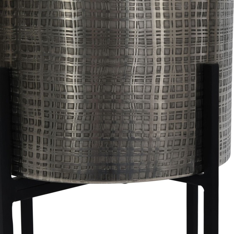 Textured iron planters for a living room