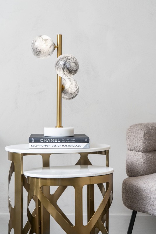 Gold Orbit lamp with solid white marble base