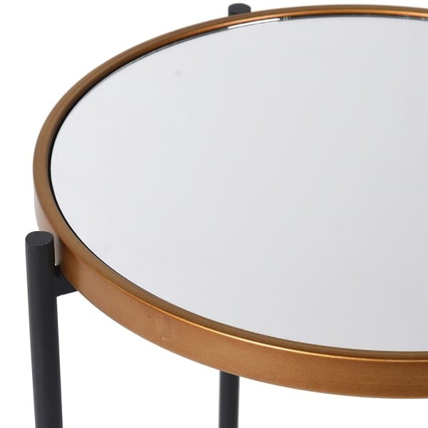 Compact gold and black side table with round mirrored tabletop