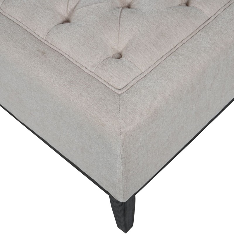 Button-tufted seat with decorative stitching