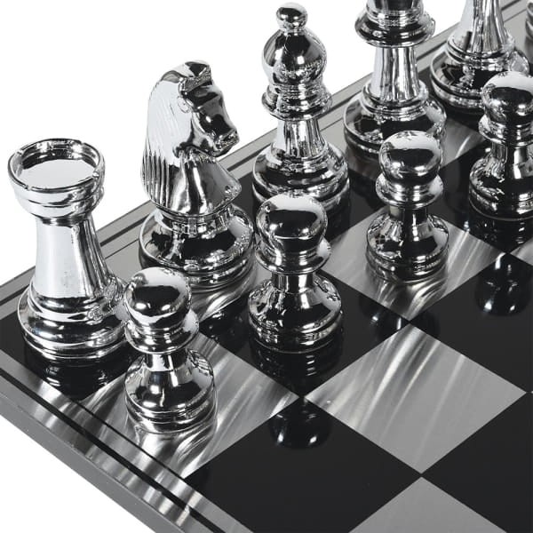 Large decorative chess set with a black and silver board