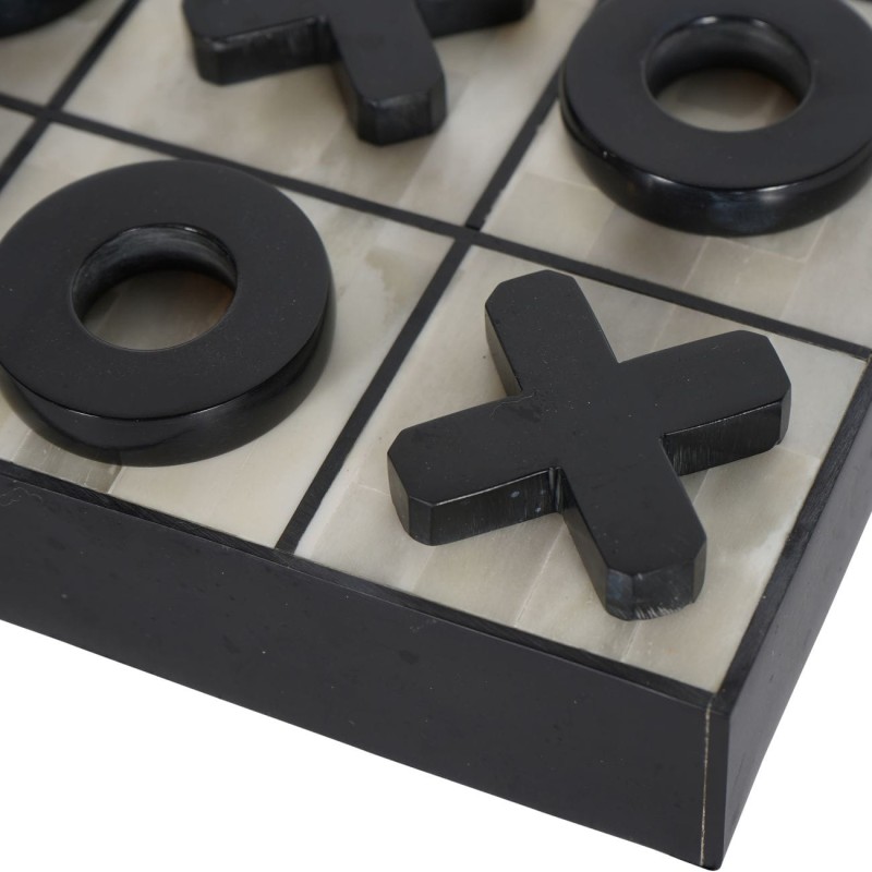 Black and cream noughts and crosses playing pieces