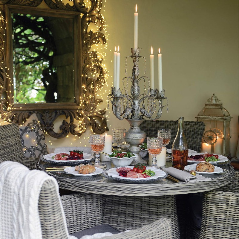 White dinner plates, side plates and bowls for four people