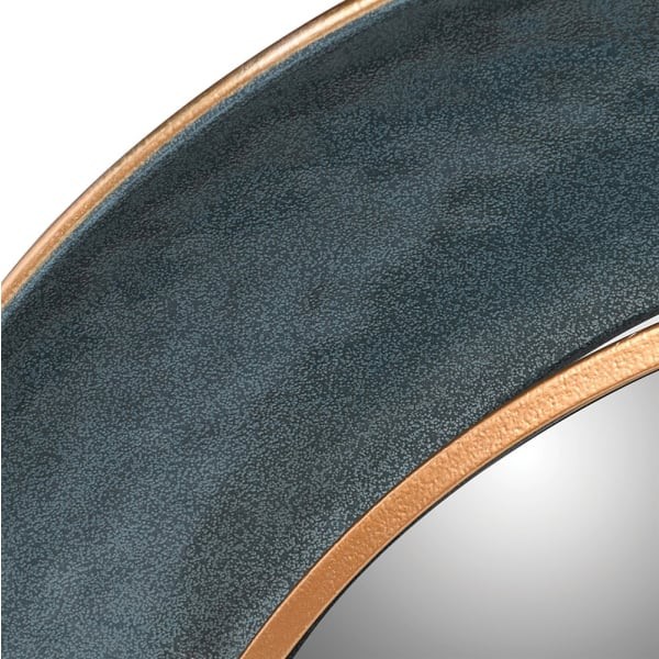 Round statement mirror with a hand-finished blue metal frame