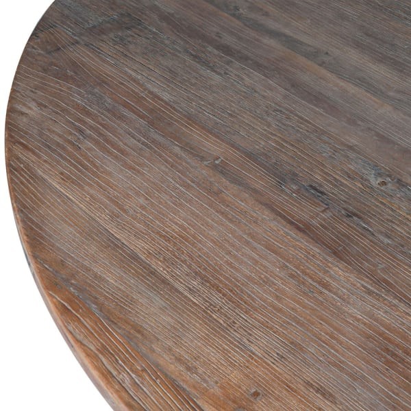 Round brown tabletop of the Telcon dining table