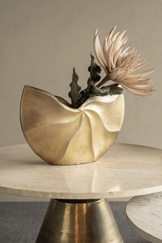 Asymmetrical gold vase made from textured aluminium