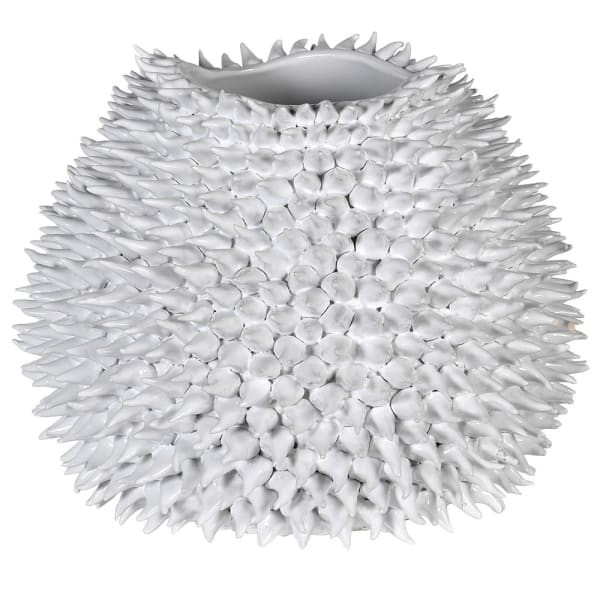 White ceramic vase with sculptural detailing