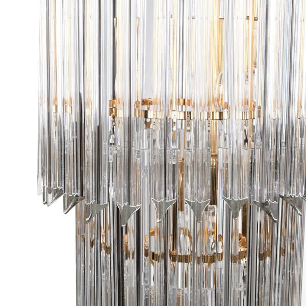 Gold chandelier with four tiers of clear glass panels