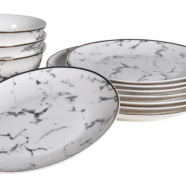 Marble-effect dinnerware arranged on a dining table