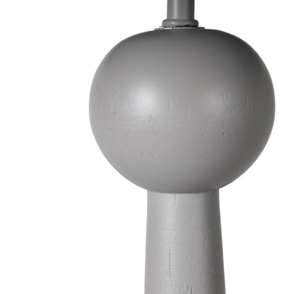 Slender tapered base of the Taprer Grey lamp