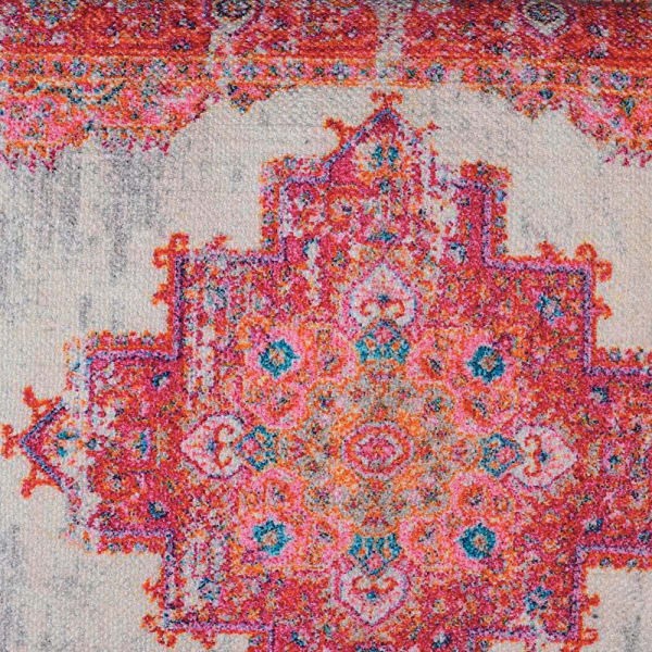 Red and beige cushions with an ornamental pattern