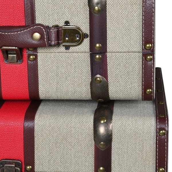 Beige decorative storage trunks with brown and red vintage details