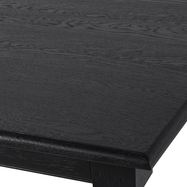 Contemporary black dining table with turned wooden legs