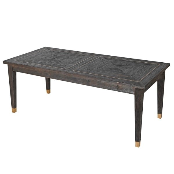 Dark brown dining table with copper-toned details