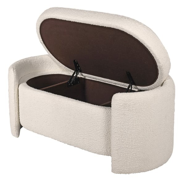 Bedroom storage bench with hidden compartment upholstered in cream bouclé fabric