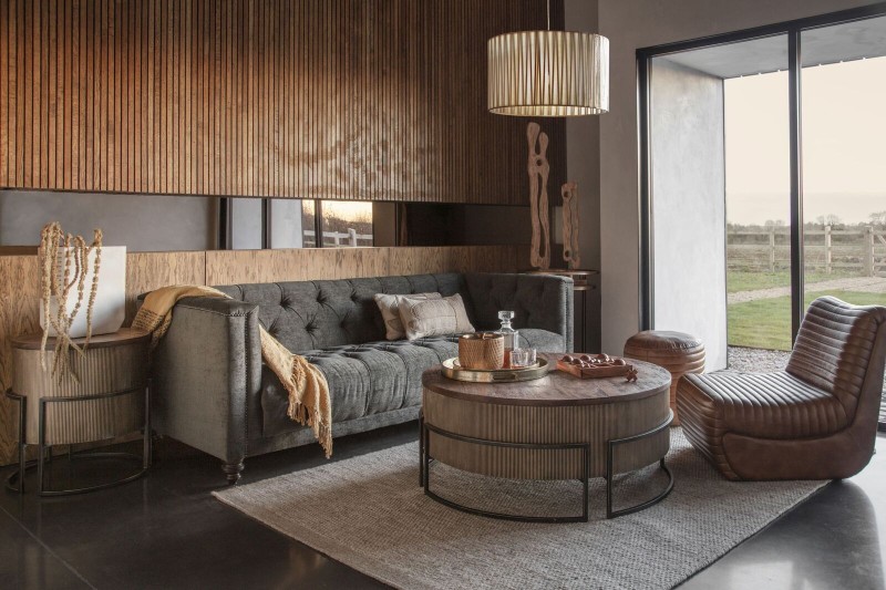 Glass pendant light with decorative panels and metal frame