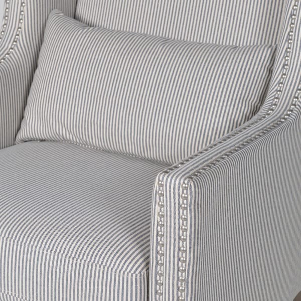 Elegant striped armchair with matching cushion