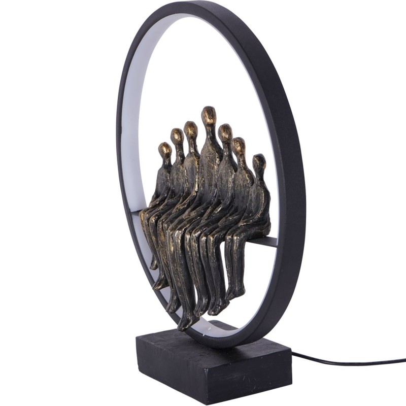 Two adults and five children within a circular LED frame