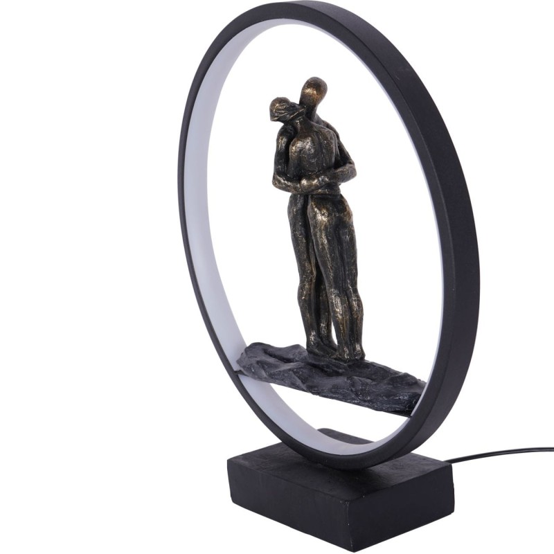 Illuminated sculpture depicting an embracing couple