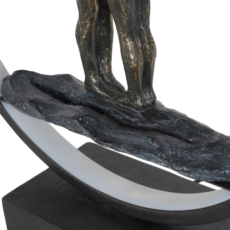 Black and bronze sculpture symbolising love