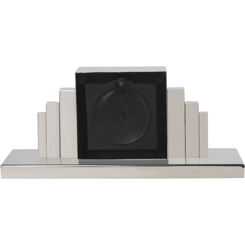 Silver mantel clock displayed on an elegant sideboard