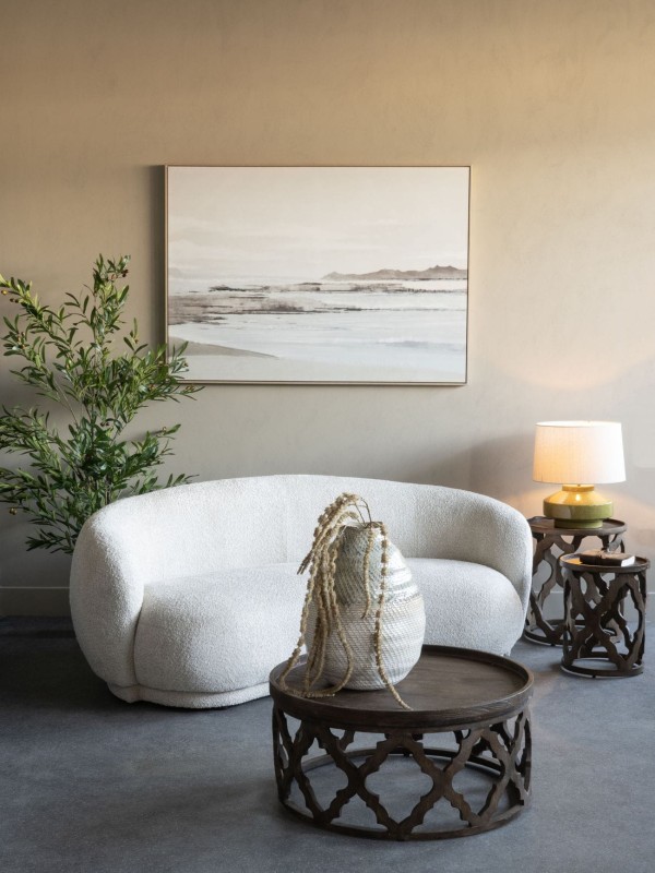 Woven L vase with a rounded organic silhouette