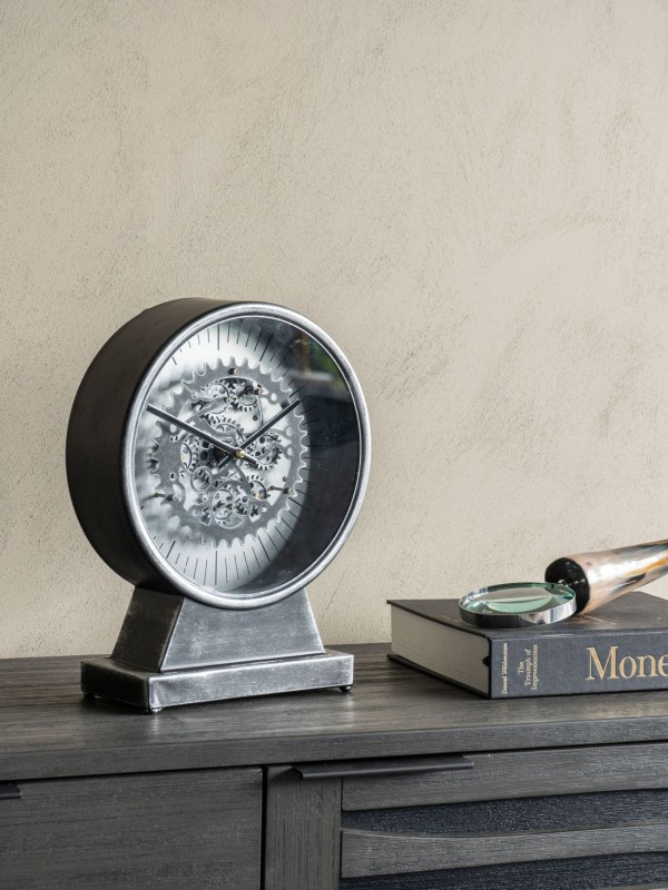 Silver table clock with exposed moving mechanism