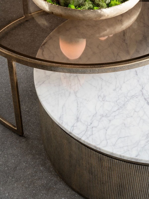 Round Primrose coffee tables in antique gold