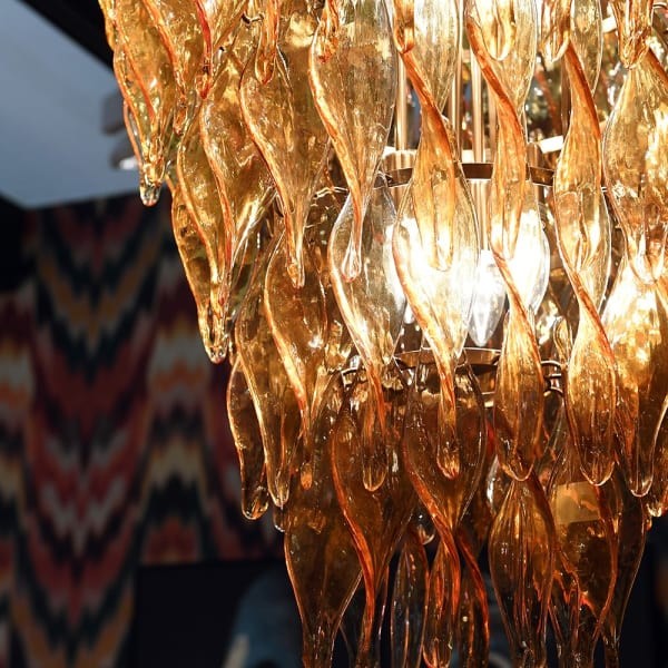 Amber glass chandelier with layered glass drops