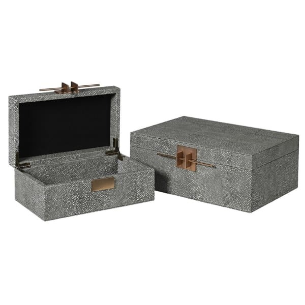 Grey Telcon storage boxes with gold-toned details