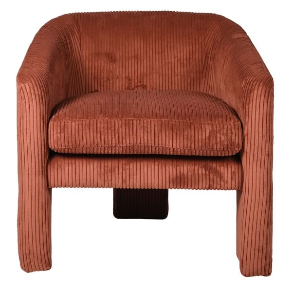 Designer orange velvet armchair for a contemporary living room