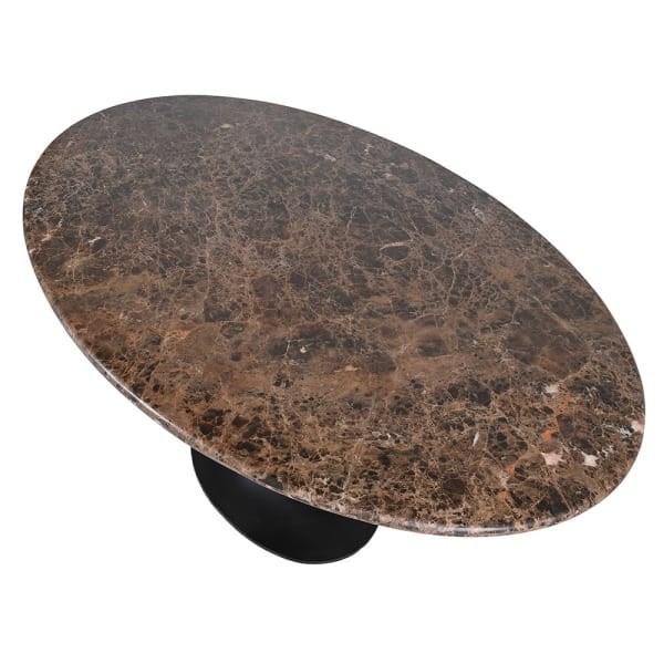 Oval dining table with a brown and black marble top