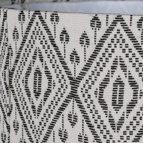 White ceramic table lamp with patterned linen shade and gold accents