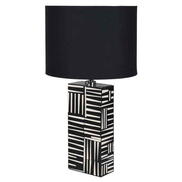 Black and white striped table lamp with sculptural block base