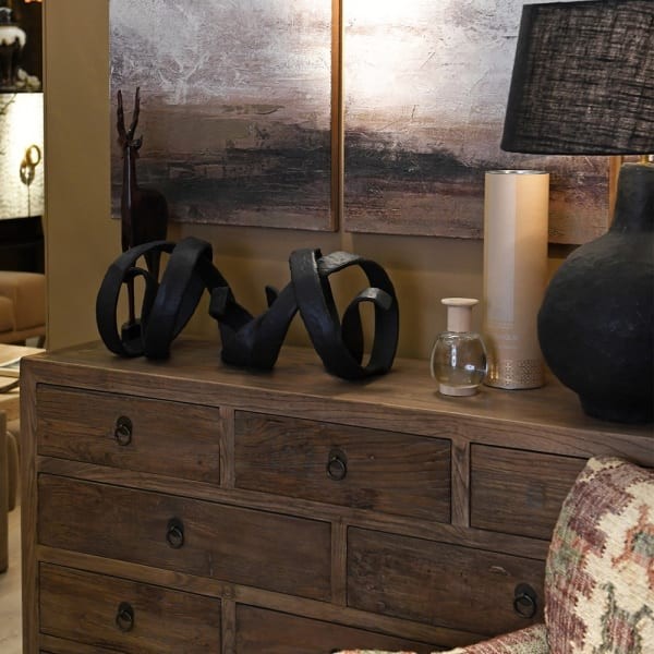 Dark brown abstract sculpture with hammered aluminium finish