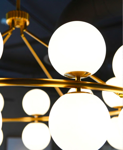Gold globe chandelier for a luxury dining room