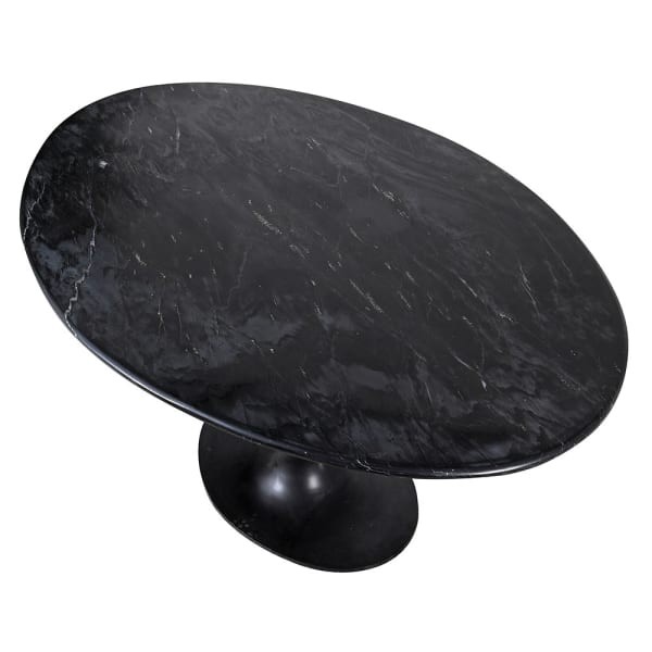 Black marble table with a central iron pedestal