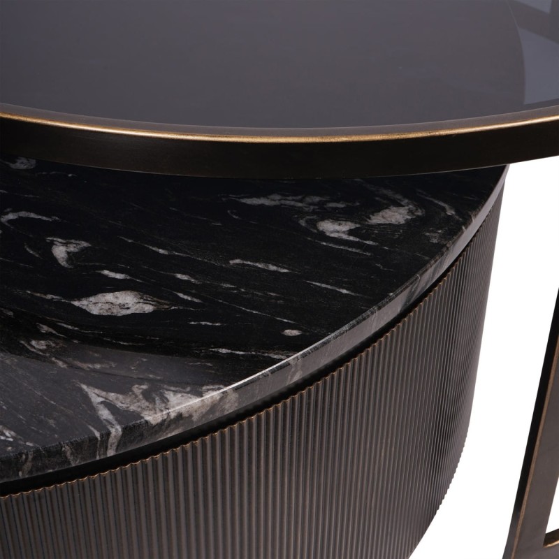 Two round coffee tables at different heights