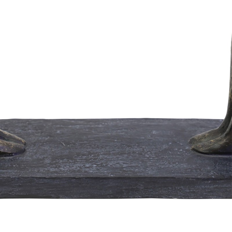 Decorative couple figurine on a dark base
