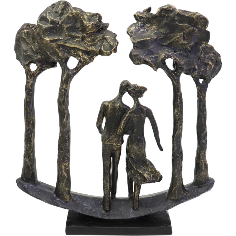 Decorative couple ornament surrounded by stylised trees