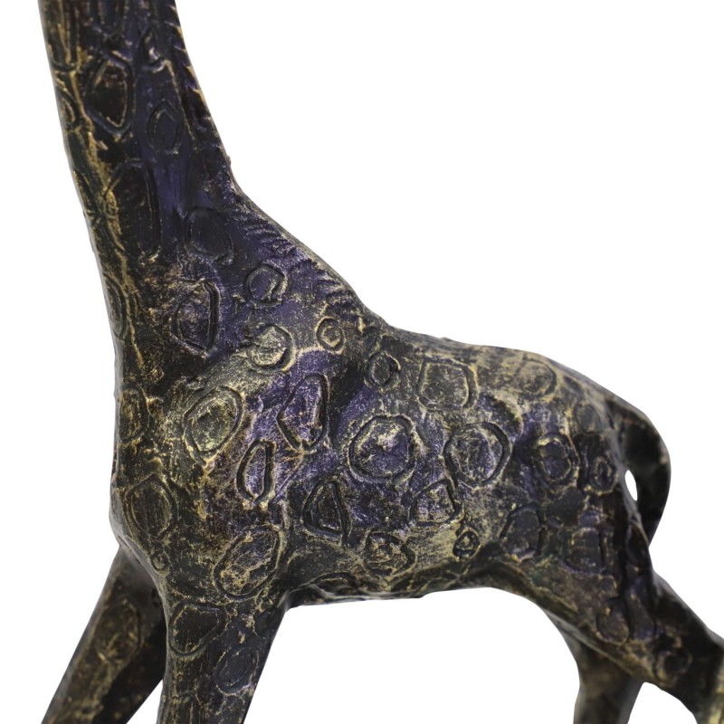 Three slender giraffes displayed on a rectangular base