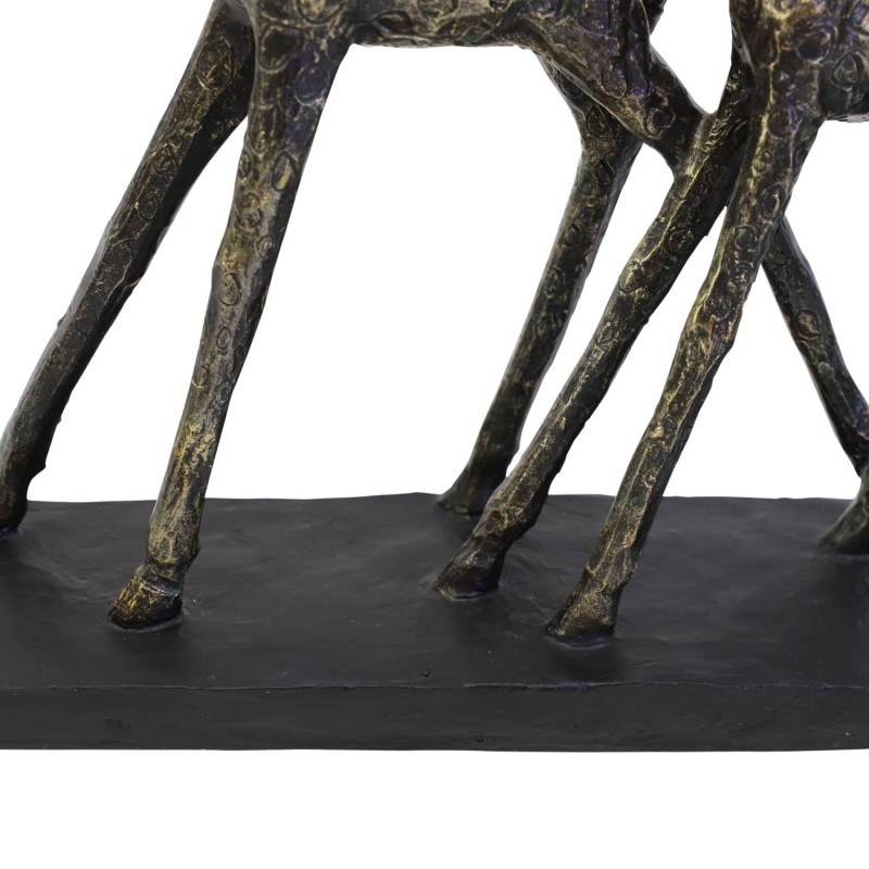 Three slender giraffes displayed on a rectangular base