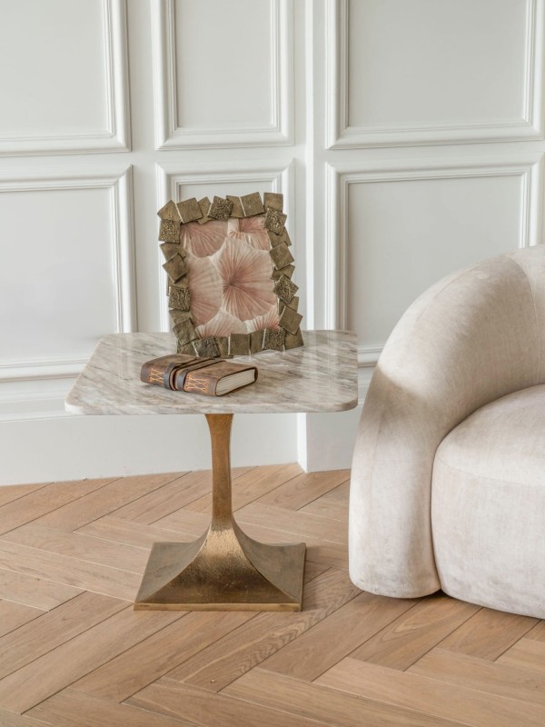 Square occasional table with a pale marble top