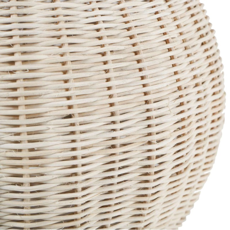 Rattan lamp styled on a living room console table
