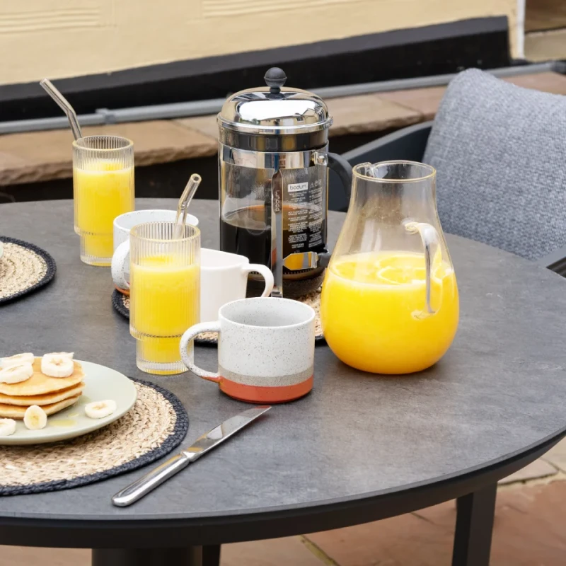 Lyall Grey Garden Furniture Set – 4 Chairs and Round Table